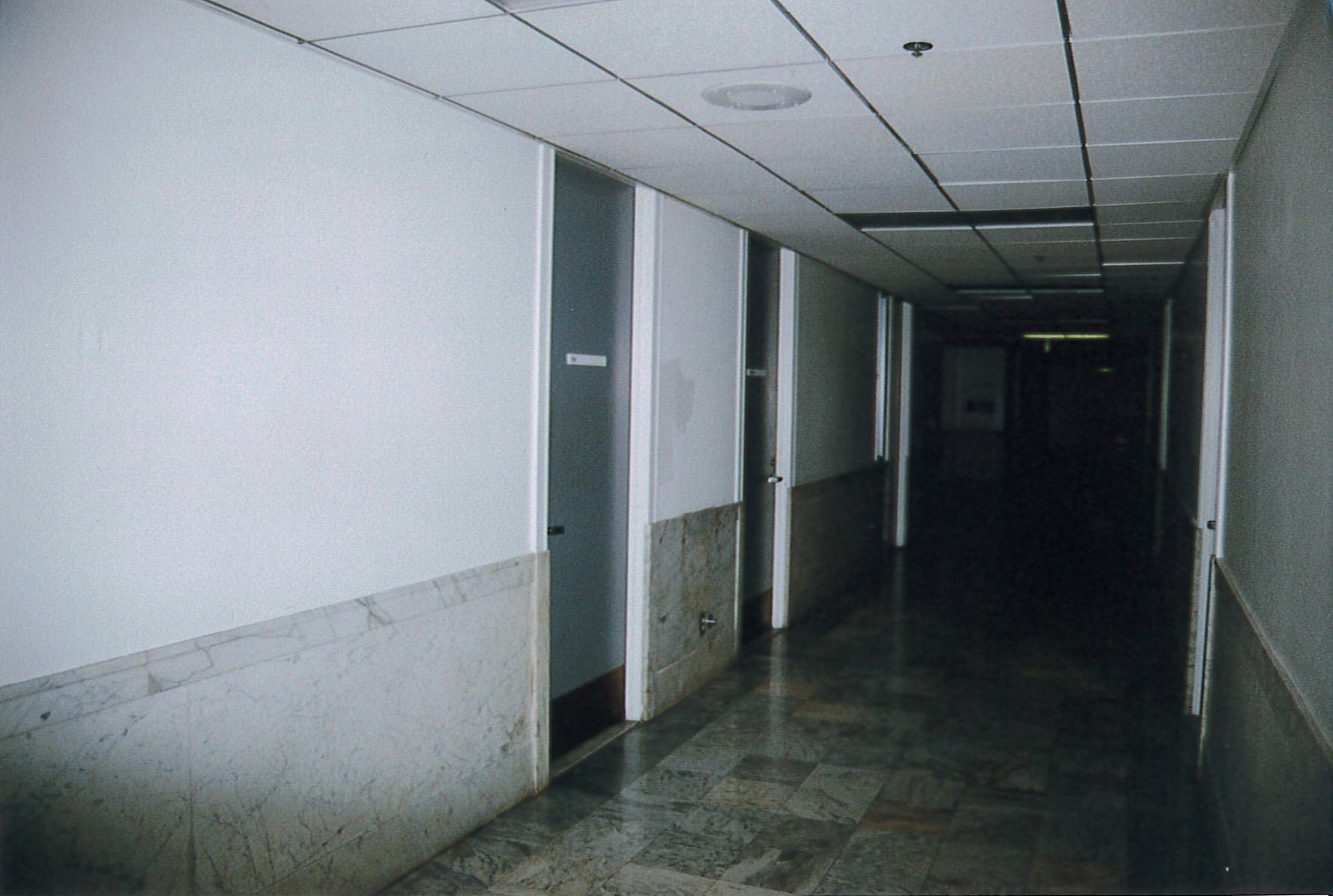 Third floor corridor showing original marble wainscoting and flooring 